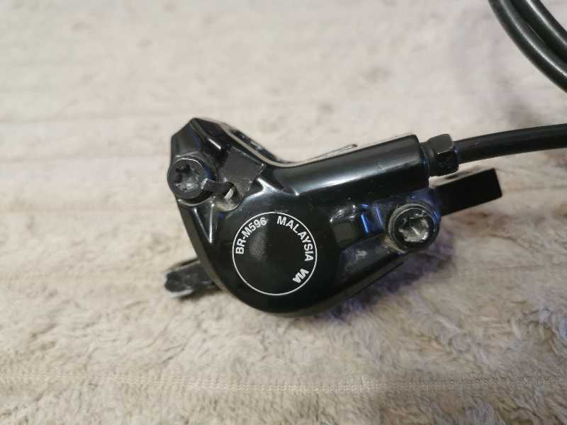 Тормоз задний Shimano Deore