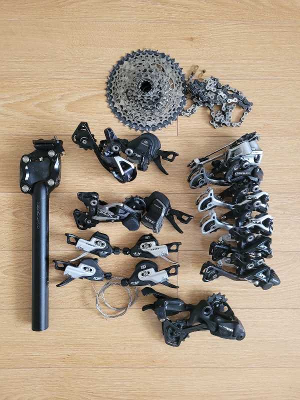 Манетки,  переключатели Shimano Deore XT,  SLX.