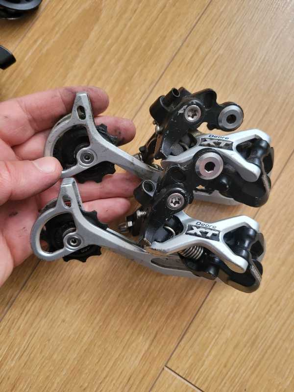 Манетки,  переключатели Shimano Deore XT,  SLX.