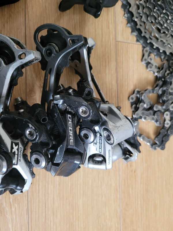 Манетки,  переключатели Shimano Deore XT,  SLX.