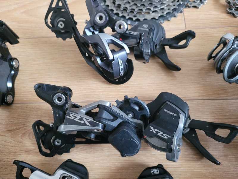 Манетки,  переключатели Shimano Deore XT,  SLX.