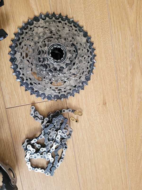 Манетки,  переключатели Shimano Deore XT,  SLX.