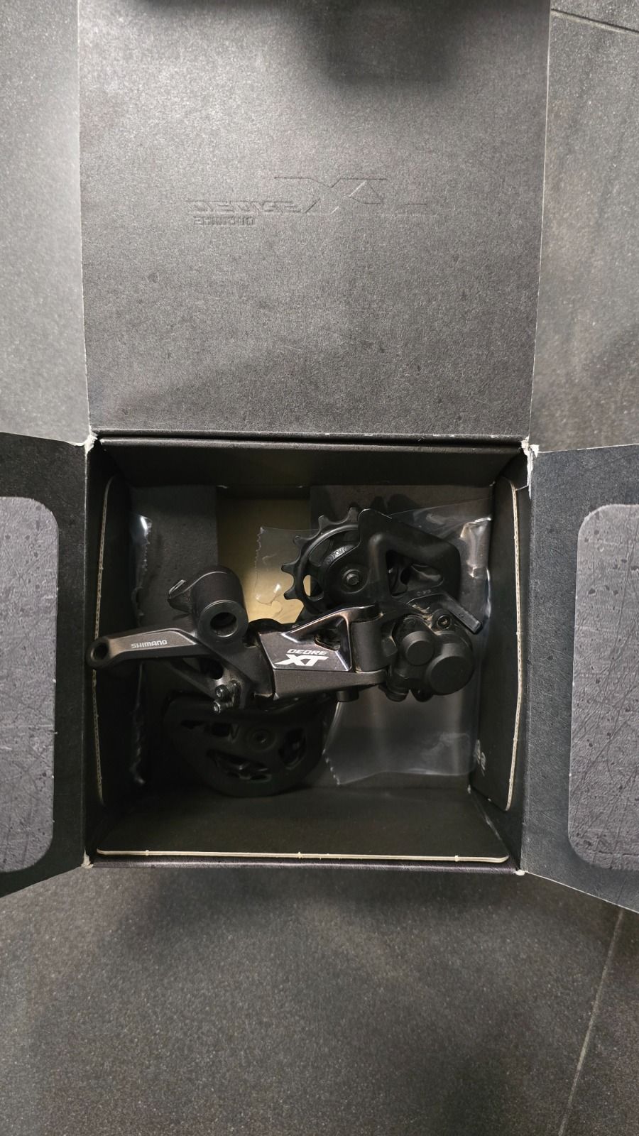 Задний переключатель Shimano Deore XT RD-M8100 12-скоростей