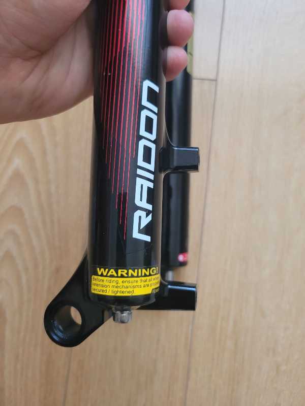 Вилка   SRSUNTOUR RAIDON AIR 27.5- 29., ось.