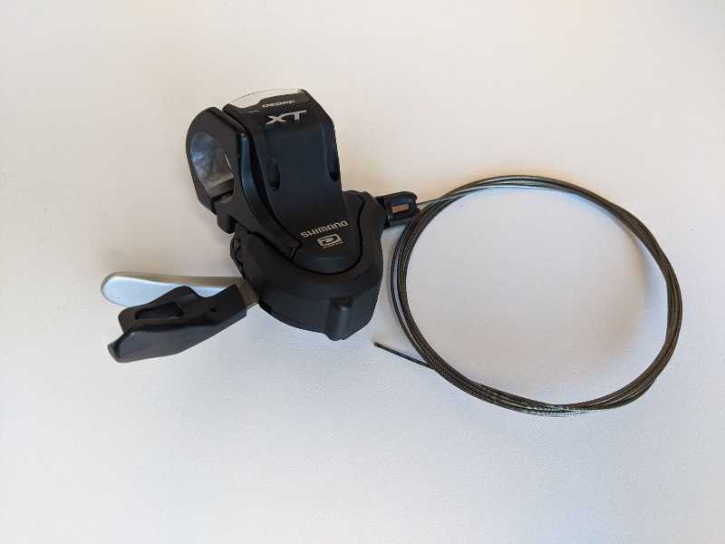 Манетки: Shimano XT M780-10ск. и Shimano SLX M7000-11ск.