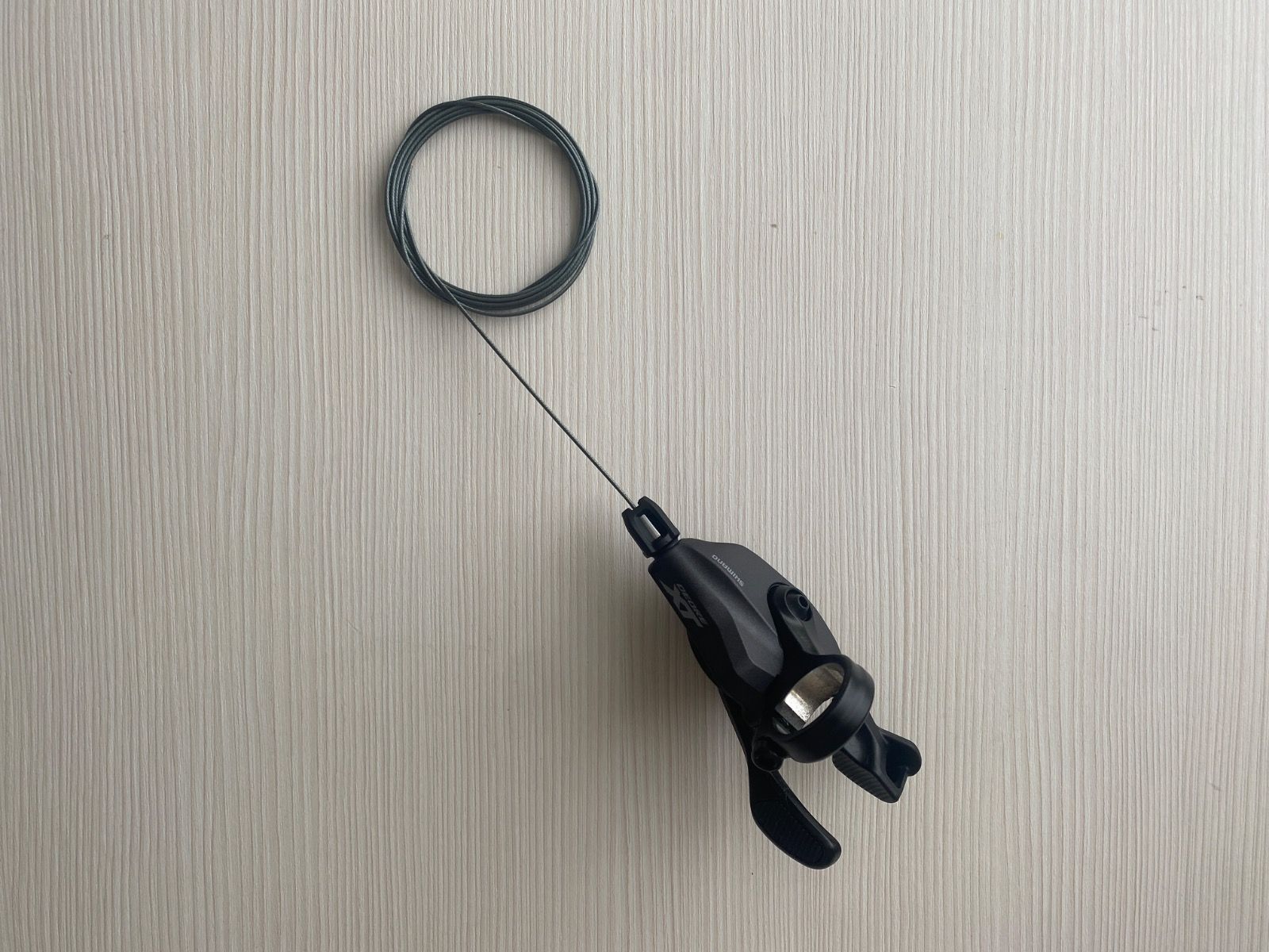 Монетка Shimano Deore XT SL-M8100-R