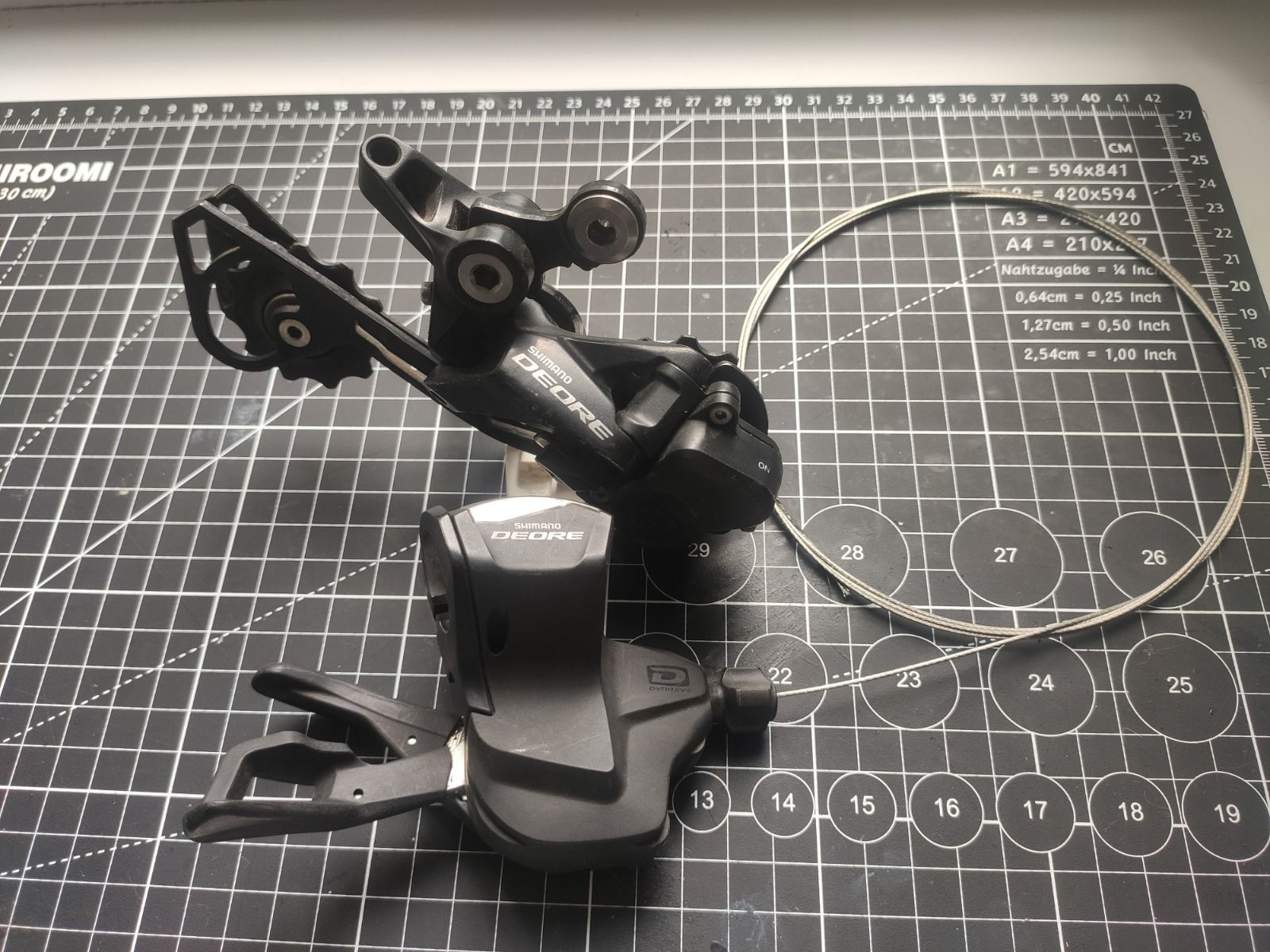 Трансмиссии Shimano Deore 10 ск. (манетка, зад.перключатель, кассета, цепь, передняя звезда NW36T BCD104)
