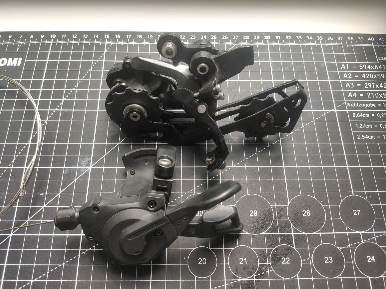 Трансмиссии Shimano Deore 10 ск. (манетка, зад.перключатель, кассета, цепь, передняя звезда NW36T BCD104)