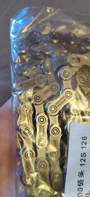 Цепь новая 12ск Shimano m6100
