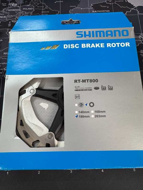 Тормоза Shimano SLX BR-M7120, 4х поршневые, servo wave, ротора RT-MT800 180mm CL, колодки новые N04C + N03A