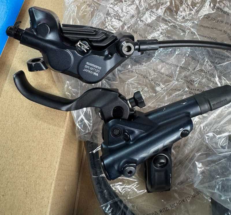 Тормоза Shimano SLX BR-M7120, 4х поршневые, servo wave, ротора RT-MT800 180mm CL, колодки новые N04C + N03A