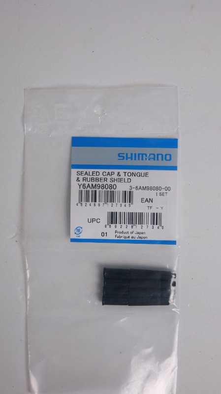 З/ч к рубашке переключения Shimano Sealed cap & Tongue & Rubber shield (Y6AM98080)