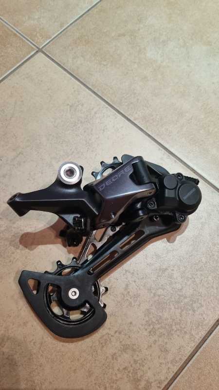 Задний переключатель  Shimano DEORE RD-M6100 на 12 скоростей.