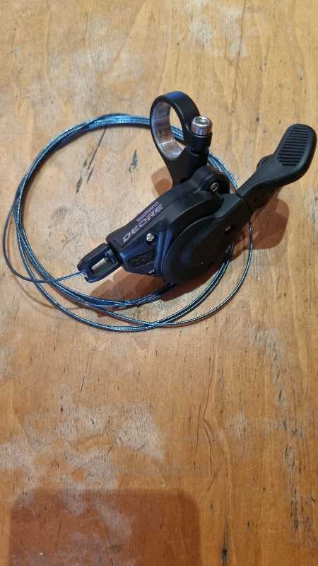 Манетка Shimano DEORE SL-M6100 12-ти скоростная.