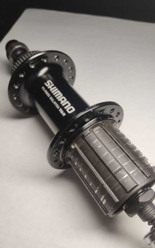 Втулка задняя Shimano FH-RM65, 135×10 мм, 32h