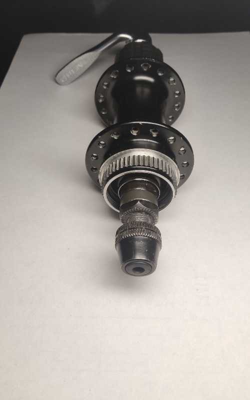 Втулка задняя Shimano FH-RM65, 135×10 мм, 32h