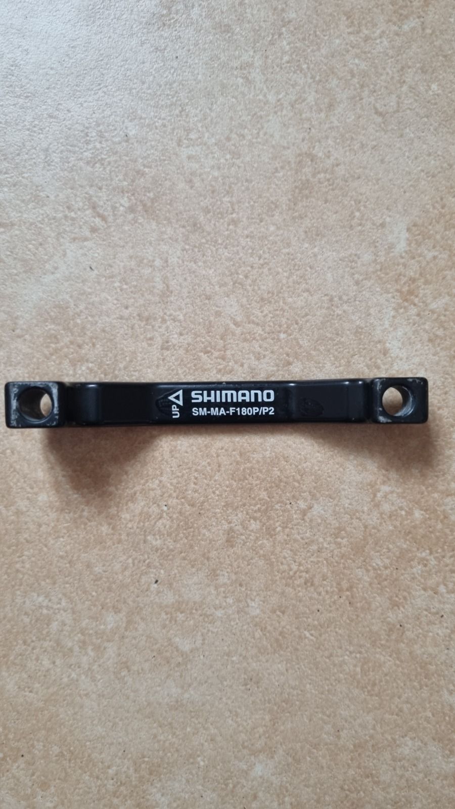 Тормозной адаптер Shimano.