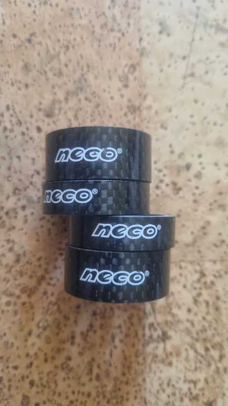 Проставочные кольца карбон на шток вилки.